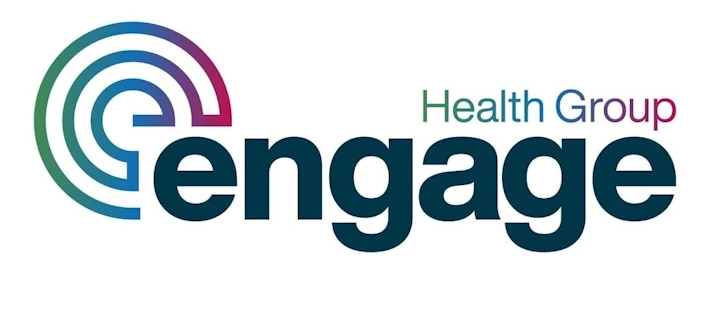 person writing in handbook